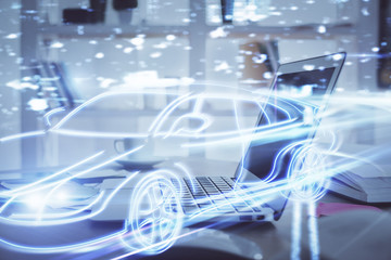 Obraz premium Desktop computer background in office with automobile hologram drawing. Multi exposure. Tech concept.