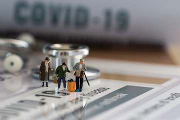 covid-19, coronavirus outbreak disease 2019 concept:Tourist traveler, businessman miniature...