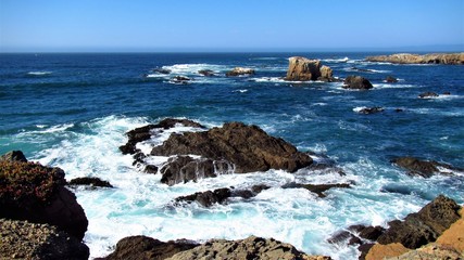 waves crashing on rocks