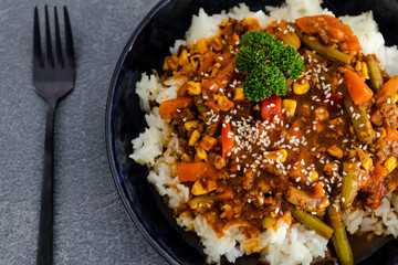 vegan mexican style rice with spicy beans and mixed veggies