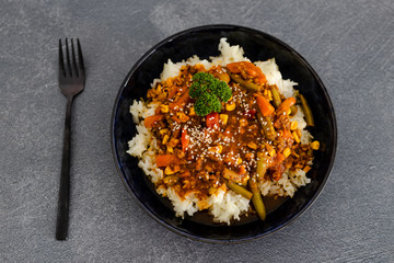vegan mexican style rice with spicy beans and mixed veggies