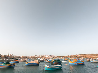 Colorful fishing boats are located in the village of Marsaxlokk.