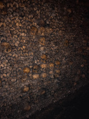 Paris, France - January 24, 2018: The famous catacombs (Les catacombs de Paris) are underground tunnels and tourist attractions, where human bones are found in the tunnels. Museum in the old vault.