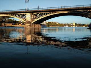 Fototapeta na wymiar Triana Bridge from the Guadalquivir River.