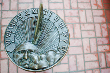 sundial on the wall