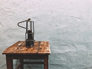 old miner lamp on the stool
