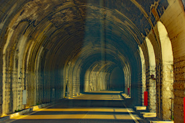 Fototapeta na wymiar Tunnel on the road to Lake Como - Varenna - Italia