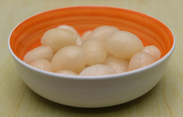 Rambutan, Asian fruit fresh peeled and served in bowl