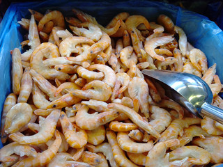 Frozen prawns in ice.
