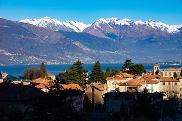 Fototapeta na wymiar Snowy mountains - Lake Como - Varenna - Italy