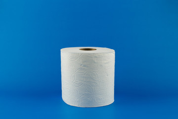 Coronavirus toilet paper crisis on a blue background with copy space