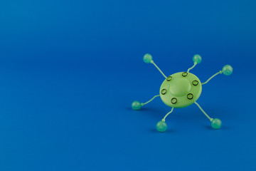 Coronavirus germs with a blue background with copy space