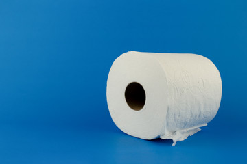 Coronavirus toilet paper crisis on a blue background with copy space