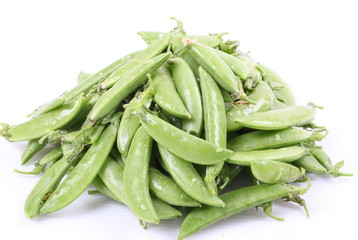 Fresh green peas isolated on white background
