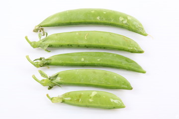 Fresh green peas isolated on white background