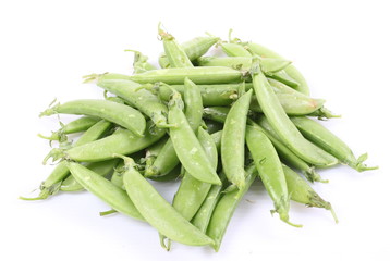 Fresh green peas isolated on white background