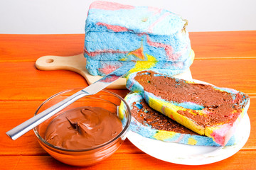 A picture of colourful bengali sliced bread with homemade chocolate spread.