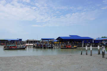 Pulau Ketam is an island at the mouth of the Klang River, near Port Klang, downstream from Kuala Lumpur. It host Chinese fishing villages comprising houses on stilts.