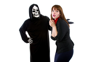 Scared businesswoman paranoid of catching a deadly disease represented by the grim reaper.  She is...