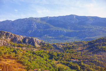 Fototapeta premium scenery with village situated in the mountains