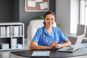 Young female doctor working in clinic
