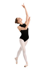 Fototapeta premium Beautiful young ballerina on white background