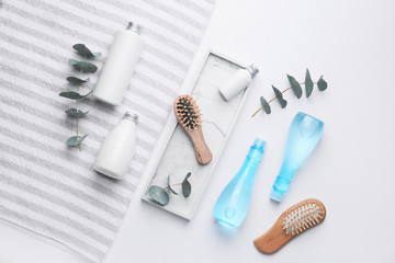 Composition with shampoo and cosmetics for hair on white background