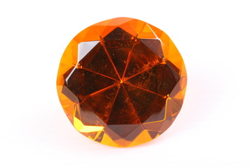 Yellow diamond on white surface