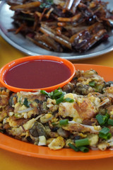 Delicious street food oh chien (Fried oyster omelette) is famous snack at Pulau Ketam restaurant.