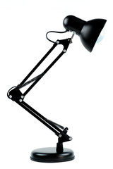 Black desk lamp isolated on white background.