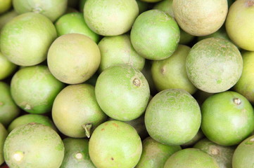 Fresh and green lemons