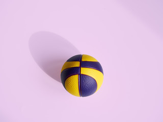 Ball isolated on a lilac background. Soccer. Football