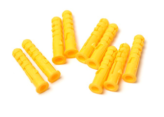 Plastic wall dowel plugs on white background