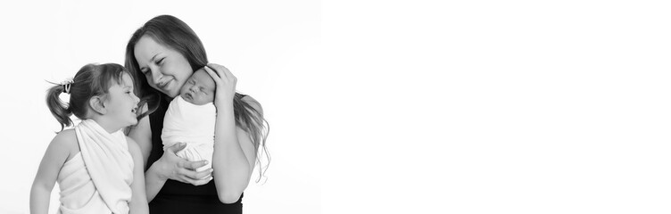 concept of healthy lifestyle, the protection of children, shopping - baby in the arms of the mother. Woman holding a child. Tree girls. Isolated on white background. Copy space. 8 march, mother's day