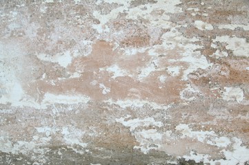 Closeup old weathered concrete wall texture with plaster