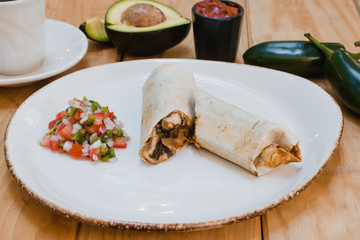 Burritos wraps mexican food with beef and vegetables. Beef burrito,