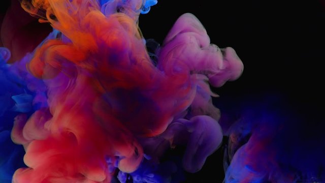 4K, Colorful paint drops mixing in water, abstract color mixing in water slow motion, drop of Ink color falling on water,  4K footage,