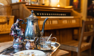 Cake and tea serving in teatime as English vintage style cuisine.