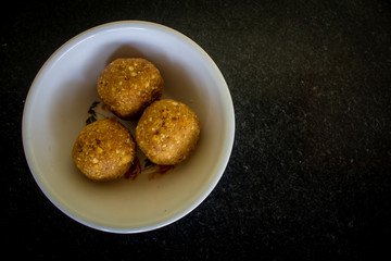 View of Peanut Jaggery balls which is a traditional south indian sweet. Peanut ladoo sweet.