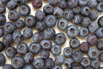 ripe juicy blueberries on a white background. Top view