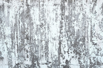White peeling paint on a metal background. Metal surface with white paint.