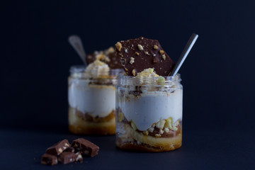 Two pieces of white cream with chocolate