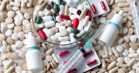 Assorted pharmaceutical medicine pills, tablets and capsules - Powered by Adobe