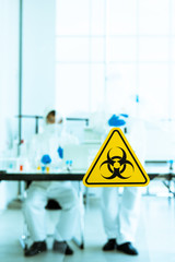 Biohazard sign or symbol in laboratory. Corona viruses or COVID-19.