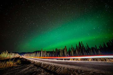 Aurora Borealis Northern Lights Yukon Territory Canada seen along the Alaska Highway in winter time...