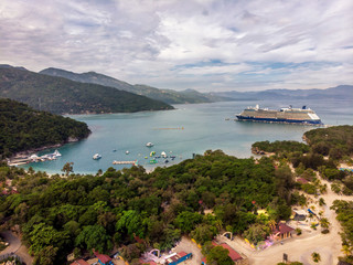 Labadee, Haiti. Aerial view on the island with a cruise ship on the background. Lush jungles.
