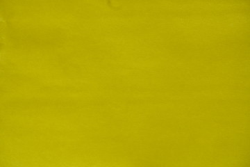 黄色の紙のテクスチャ背景素材