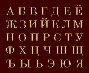 Golden English alphabet on a red background.