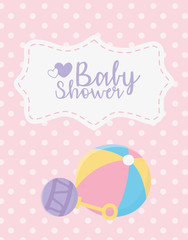 baby shower, rattle and ball toys dotted pink background celebration card