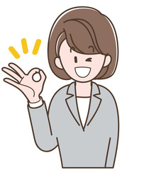 OKサインをするスーツの女性